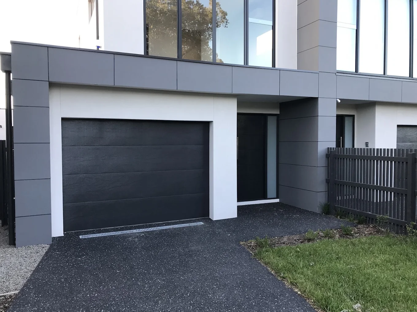 Sectional garage door installed by Caeser